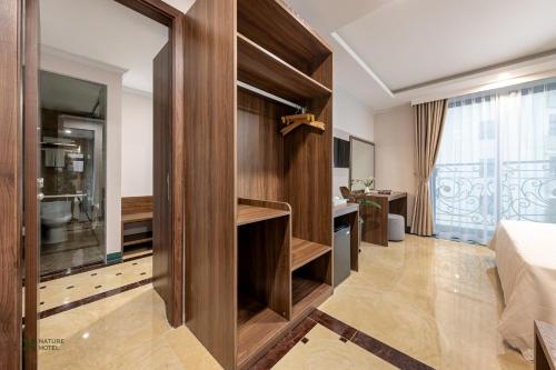 TV a/nebo společenská místnost v ubytování Nature Hotel