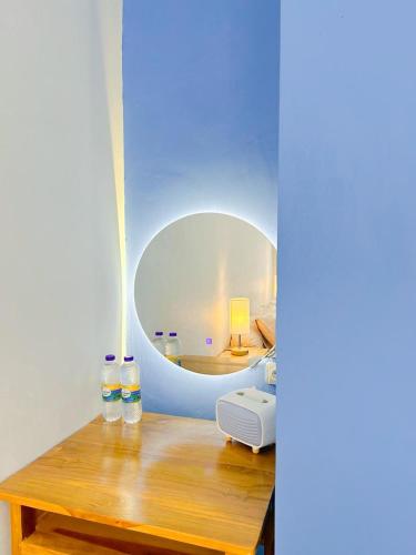 Una cama o camas en una habitación de OsCo Paviliun