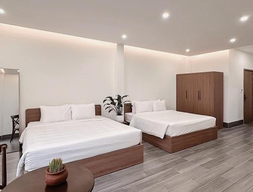 Postel nebo postele na pokoji v ubytování HANDstay Nghinh Phong