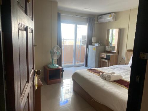 Katil atau katil-katil dalam bilik di Hug me guesthouse