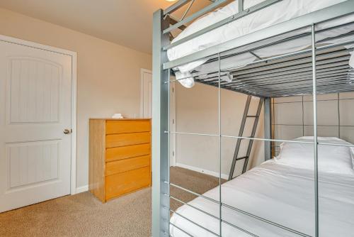 a bedroom with two bunk beds and a closet at Spacious Atlanta Home with Yard and Charcoal Grill! in Atlanta