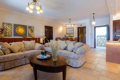 Zona de estar de Solaris Methea Deluxe Suites