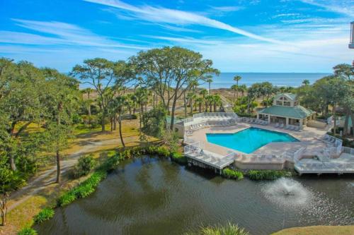 an aerial view of a house with a swimming pool at Beachfront Bliss in Hilton Head Island