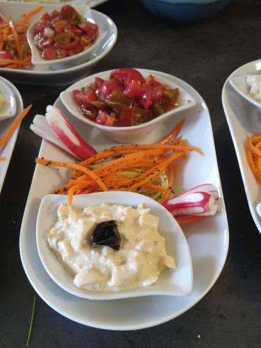 a plate of food with vegetables on a table at Rêve de Causse in Saint-Michel