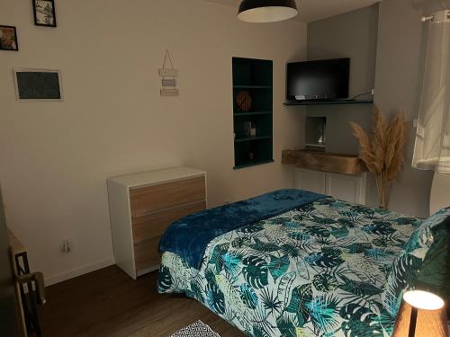 Postel nebo postele na pokoji v ubytování Chambre indépendante en toute autonomie
