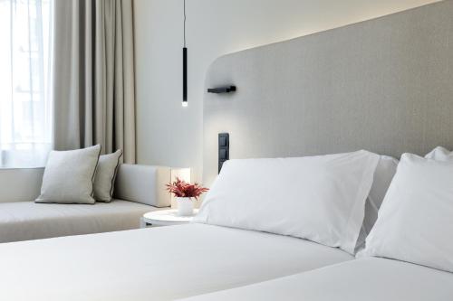Cama o camas de una habitación en Royal Ramblas