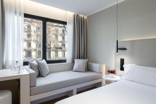 Cama o camas de una habitación en Royal Ramblas