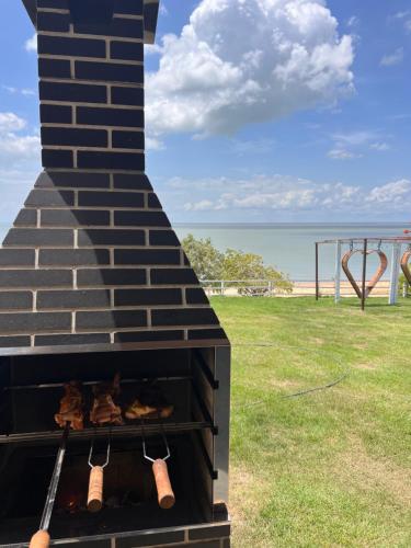 a brick oven with a bunch of shoes on it at Pousada Olivas do Tapajós in Belterra