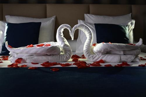 Ένα ή περισσότερα κρεβάτια σε δωμάτιο στο Imperio Hotel Cernavoda