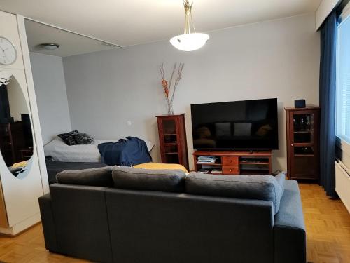 City Apartment Päiviönkatu tesisinde bir oturma alanı