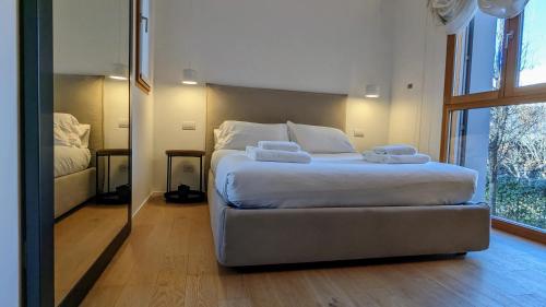 Voodi või voodid majutusasutuse Elegante appartamento con piscina - Navigli - NABA toas