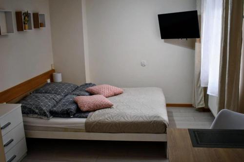 Katil atau katil-katil dalam bilik di Pokoje gościnne Muszelka