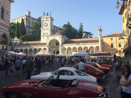 a group of cars parked in front of a building at Alloggio Agrituristico Ai Tre Castelli in Moruzzo