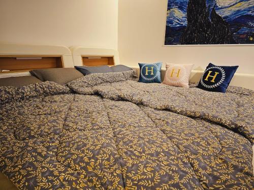 Ένα ή περισσότερα κρεβάτια σε δωμάτιο στο Sosaeul Avenue