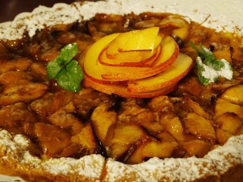 a plate of food with meat and vegetables on it at Hotel Santo Stefano in Portoferraio