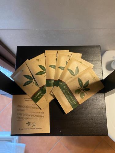 a box filled with brown paper with leaves on it at B&B Molinetto in Piacenza