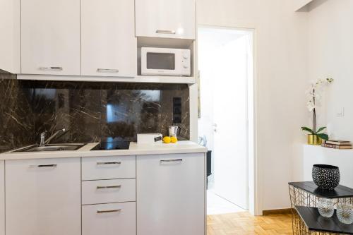 Kuchyňa alebo kuchynka v ubytovaní Center of Athens: Iris cozy apartment