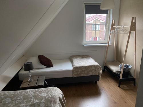 Postel nebo postele na pokoji v ubytování Villa BUITENLUST 40 km From Amsterdam