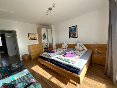 a bedroom with a bed in a room at Sunny apartment in Pähl in Pähl
