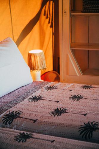 Ένα ή περισσότερα κρεβάτια σε δωμάτιο στο NOMAD GLAMPING