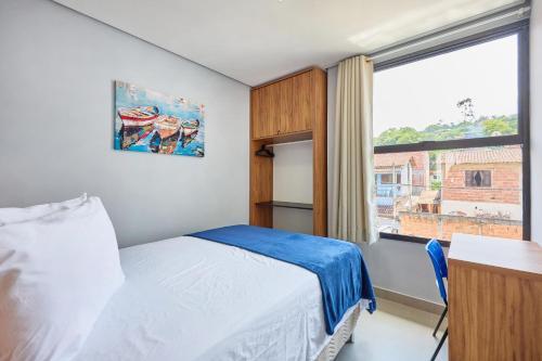 Postel nebo postele na pokoji v ubytování Villa da Serra 3 Paraty Piscina Aquecida Master