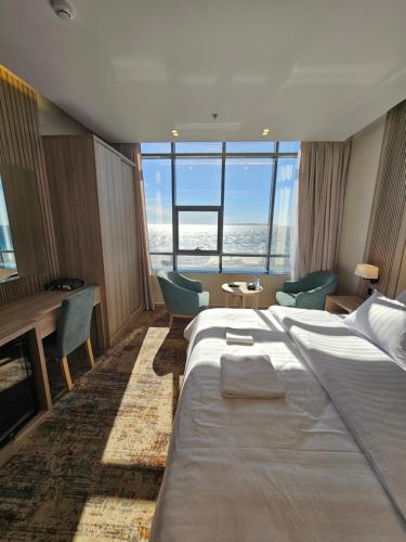 Postel nebo postele na pokoji v ubytování فندق سي قل - Sea gull Hotel