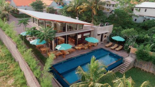 an aerial view of a house with a swimming pool at Sayana Bali Resto & Bar in Gianyar