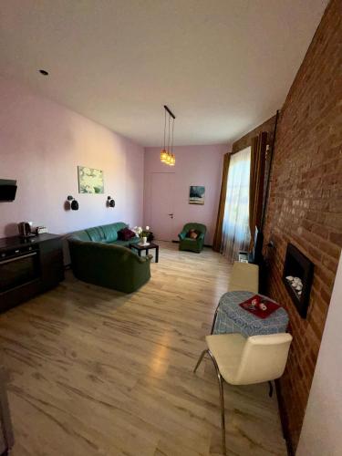 Μια τηλεόραση ή/και κέντρο ψυχαγωγίας στο Saules Apartament