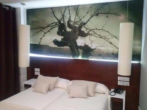 Cama o camas de una habitación en Hotel La Casota