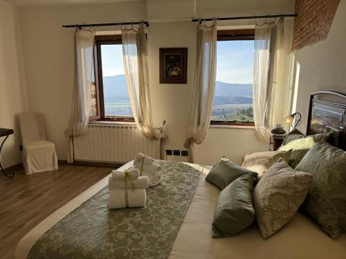 Ένα ή περισσότερα κρεβάτια σε δωμάτιο στο B&B La Casa del Sarto
