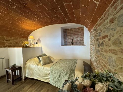 Ένα ή περισσότερα κρεβάτια σε δωμάτιο στο B&B La Casa del Sarto