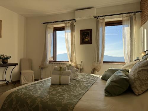 Ένα ή περισσότερα κρεβάτια σε δωμάτιο στο B&B La Casa del Sarto