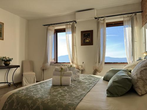 Ένα ή περισσότερα κρεβάτια σε δωμάτιο στο B&B La Casa del Sarto
