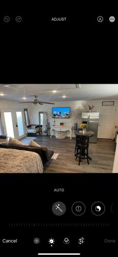 a view of a bedroom with a living room at Serenity home in Laplace