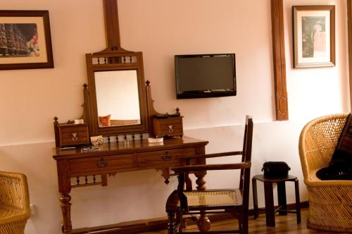 Télévision ou salle de divertissement dans l'établissement Casa Cottage