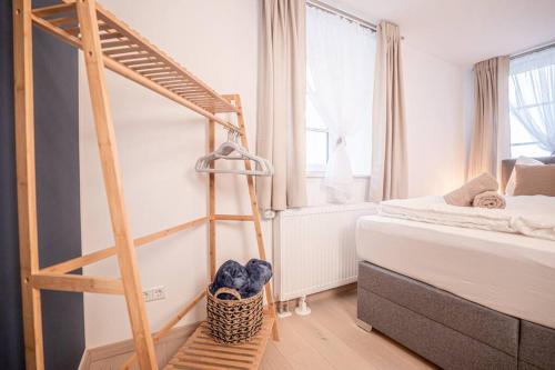 a bedroom with a bunk bed and a ladder at Gemütliche Oase im Denkmal in Bönnigheim