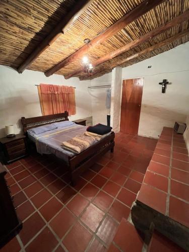 Postel nebo postele na pokoji v ubytování Mi casita de Los Andes Cabaña Familiar Apartaderos Merida