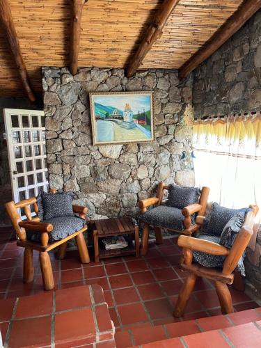 Posezení v ubytování Mi casita de Los Andes Cabaña Familiar Apartaderos Merida