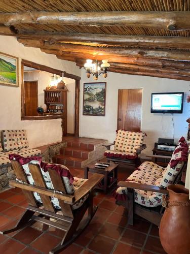 Posezení v ubytování Mi casita de Los Andes Cabaña Familiar Apartaderos Merida