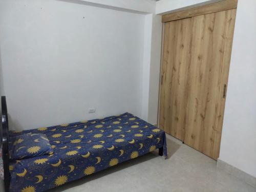 Cama o camas de una habitación en Casa de descanso unifamiliar - Venecia, Antioquia