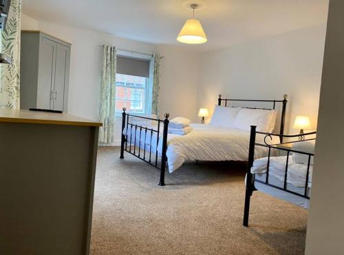 Voodi või voodid majutusasutuse The Old Jolly toas