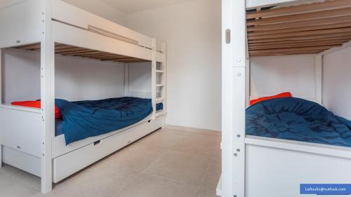 Postel nebo postele na pokoji v ubytování Le Roulis De Panne