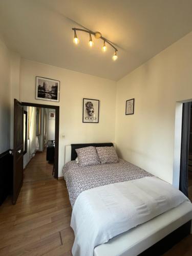 Кровать или кровати в номере Maison Jehan-Séré