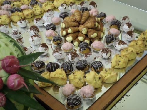 a tray of different types of donuts and other pastries at Terme Villa Pace in Abano Terme