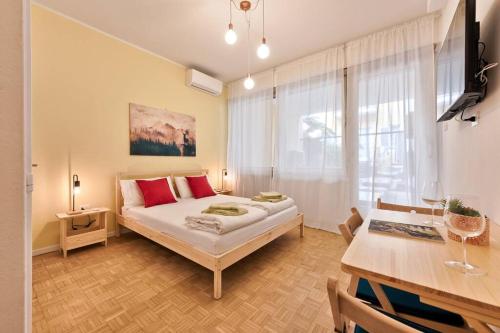 Ένα ή περισσότερα κρεβάτια σε δωμάτιο στο Apartment Lauben Bolzano