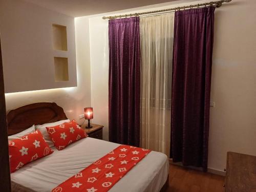 Posteľ alebo postele v izbe v ubytovaní Appartement pour famille à Agadir 10 minutes de la plage Parking gratuit