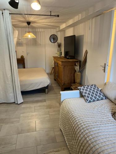 Katil atau katil-katil dalam bilik di Logement ICARE 5km de Crolles, Soitec , ST