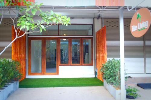 a front door of a building with a entrance at The Living - Holiday Home Phayao in Phayao