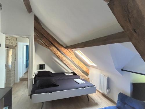Posteľ alebo postele v izbe v ubytovaní Kentañ - Maison insolite intra-muros à Guérande