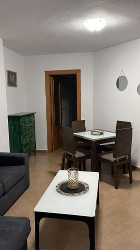 a living room with a couch and a table at FH CAMP PRECIÓS II in Altea